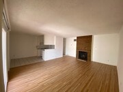 Living room with fireplace - 3717 Cardiff Ave Apartments