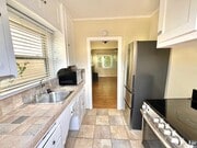 Photo - Cute North Park Bungalow! 2bd/1ba, 1 car garage, AC, W/D in-unit, fenced yard!