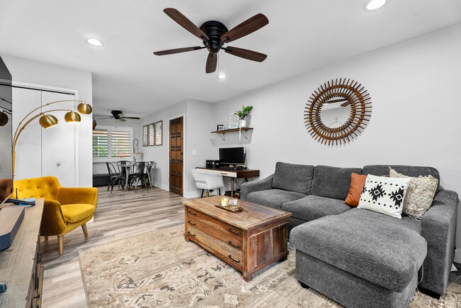 Building Photo - 6600 Warner Ave Unit 119