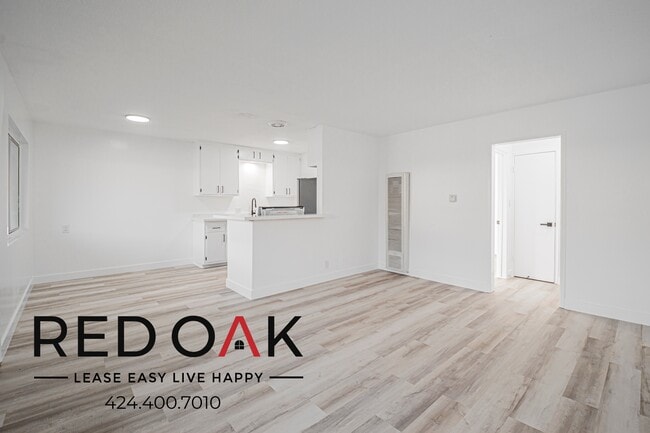 Building Photo - 6501 Cherry Ave Unit 9