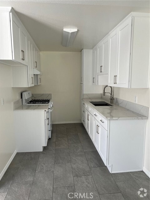Building Photo - 7039 Remmet Ave Unit I Rental
