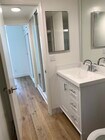 Studio bathroom - The Malibuan Apartments