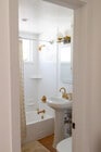 Full Bath w/shower and tub and modern toilet. Brass fixtures - 2150 Euclid Ave Unit A