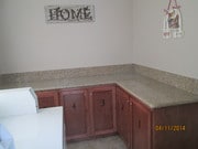 Laundry room with secure storage bin - 1117 Shenandoah St Apartment Unit 6