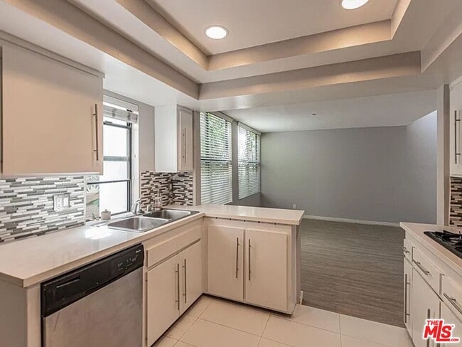 Building Photo - 1610 Camden Ave Unit E