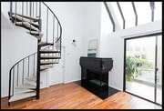 Natural light w/Staircase that leads to Huge Loft - 1957 Temple Ave Condo Unit 205