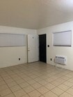 Living Room all tile floors - 220 N Hagar St Unit D