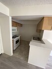1BR, 2BA - 750 - Kitchen - A & J Investments