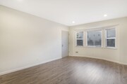 front door entry to living room with new recessed lighting - 4091 Rosecrans Ave