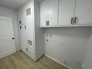 Laundry room - 437 W 11th St Apartments Unit 2
