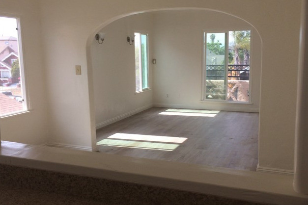 View from kitchen to dinner and living rooms - 1500 W 46th St Apartments Unit 4