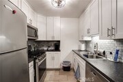 Photo - 6600 Warner Ave Condo Unit 121