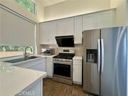 Photo - 7839 E Menton Ave Townhome