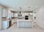 Photo - Stunning and Spacious 6BR 5BA Home w/ Solar Panels + Quartz Counter + Fenced Yard + 2 Car Garage ...