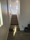 STAIRS TO BEDROOM 2 - 205 7th Ave Apartment Unit 2