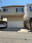 Parking in garage and apron - 420 Marine Pl Apartments Unit A