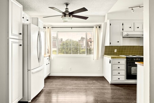 Kitchen window towards courtyard - 8130 Redlands St Unit 12