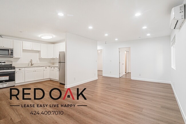 Building Photo - 649 W 92nd St Unit 649 1/2