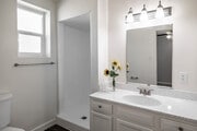 3BR, 2BA - 1,100SF - Primary Bathroom - Somerset plaza Apartments