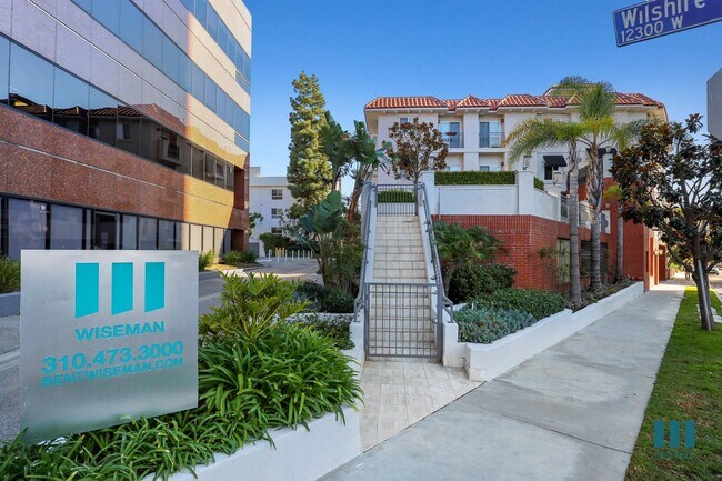 Sidewalk View of McClellan Corner - McClellan Corner