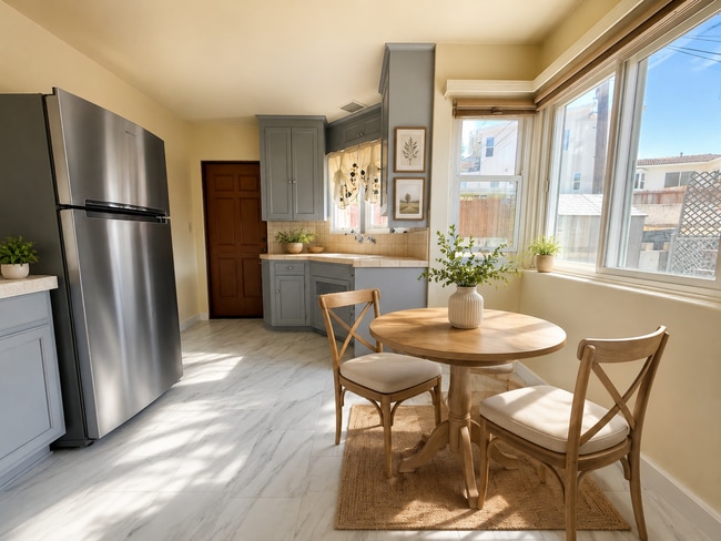 Photo - Cozy Two Bedroom Duplex w/ Hardwood Floors! Lovely Kitchen! Lots of Natural Light!