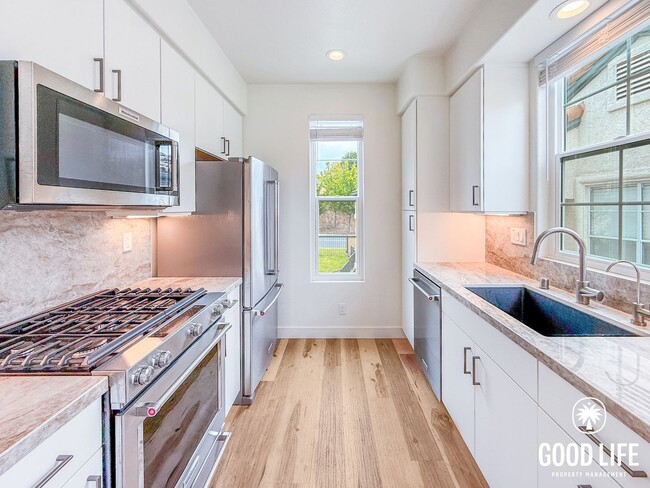 Building Photo - SD: Bright 1BD/1BA Condo in Carmel Valley with Pool, Private Balcony & In-Unit Laundry Unit 302