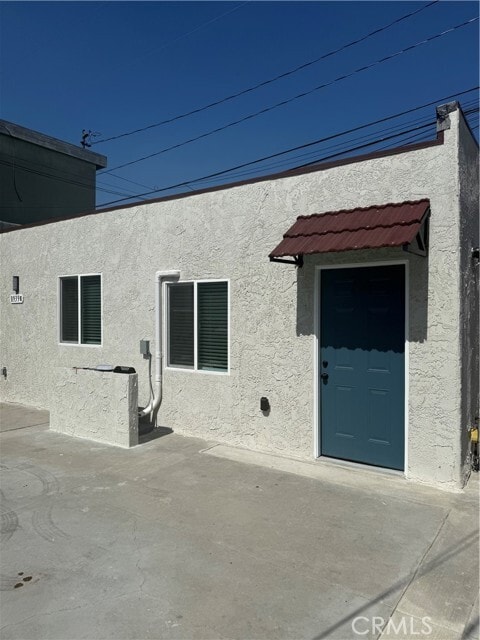 Building Photo - 8939 Elizabeth Ave Unit E