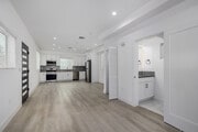 2BR, 2.5BA - 1,200SF - Living Room - 1301 E 27th St
