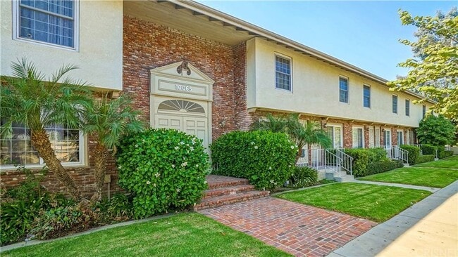 Building Photo - 10065 De Soto Ave Unit 212