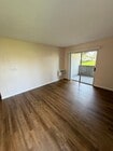 Photo - 2BR/1BA Lakeside ground floor condo with 1 car detached garage, 1 uncovered parking space & commu... Unit A