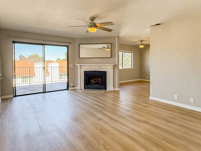 Living Room with gas fireplace. Leads out to large balcony and views - 3086 Corte Trabuco
