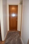 Hallway and Door to Back Bedroom - 423 S Indiana St House
