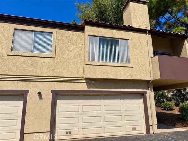 Building Photo - 9385 Mesa Verde Dr Unit E