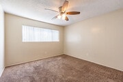 2BR, 1BA - 953SF - Primary Bedroom - Villa Santa Fe Apartments