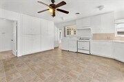 Photo - Spacious 4-Bed Home with Backyard, Garage & Prime Westside Access