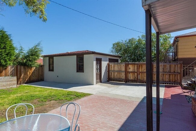 Shared storage in oversized one car garage on-site. - 1931 33rd St
