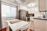 Photo - 6600 Warner Ave Condo Unit 121