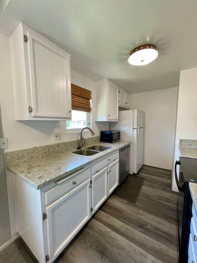 Photo - 2 bedrooms, 1 bath with carport Home is Close to the 52, 67 and 125 freeways, shopping and restau...
