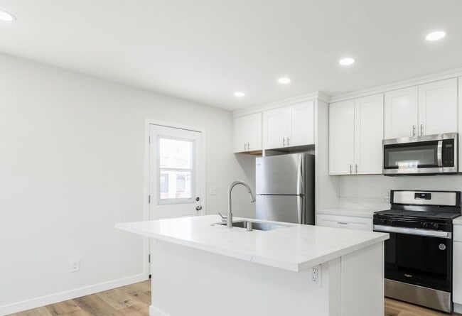 Photo - Welcome to your beautifully renovated single level home in the heart of Oceanside! Unit 305 Holly St.