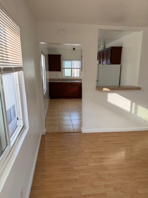 large kitchen that opens up to living room. - 4626 E 7th St Unit upstairs 1bed 1bath