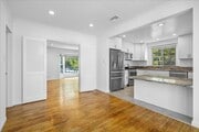 Photo - Corner lot home on a classic tree lined Beverly Hills street