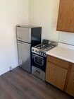 New wood floor & Stainless Steel appliances. - 622 Glenwood Dr Unit Apartment D