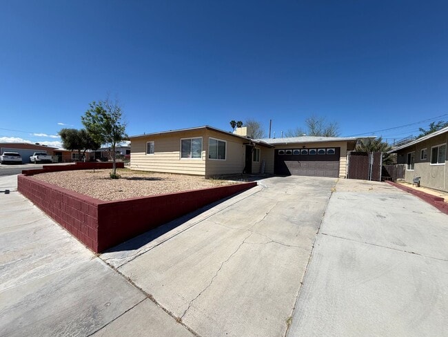 Photo - 3 Bedroom 2 Bathroom House with Central A/C , 2 Car Garage and Beautiful Backyard with Covered Patio