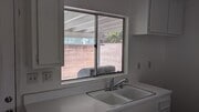 Kitchen Window to back yard - 10125 De Soto Ave Townhome