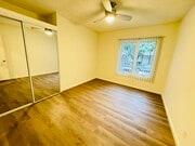 UNIT #1 SECONDARY BEDROOM - 7548 Lexington Ave Apartments