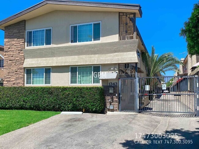 Building Photo - 1343 E Harvard St Unit J