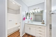 2BR, 2BA - 1010SF - Primary Bathroom - Harris Place Apartments