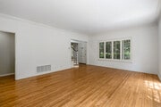 2BD, 2.5BA - 1,550SF - Living Room - Camden Drive Apartments