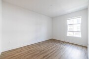 3BR, 2BA - 1,295SF - Bedroom - Lumia Apartments