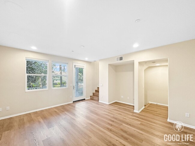 Photo - Modern 3-Story Townhome in Bay Park – 3BR/3.5BA with Pool, Balcony & In-Unit Laundry